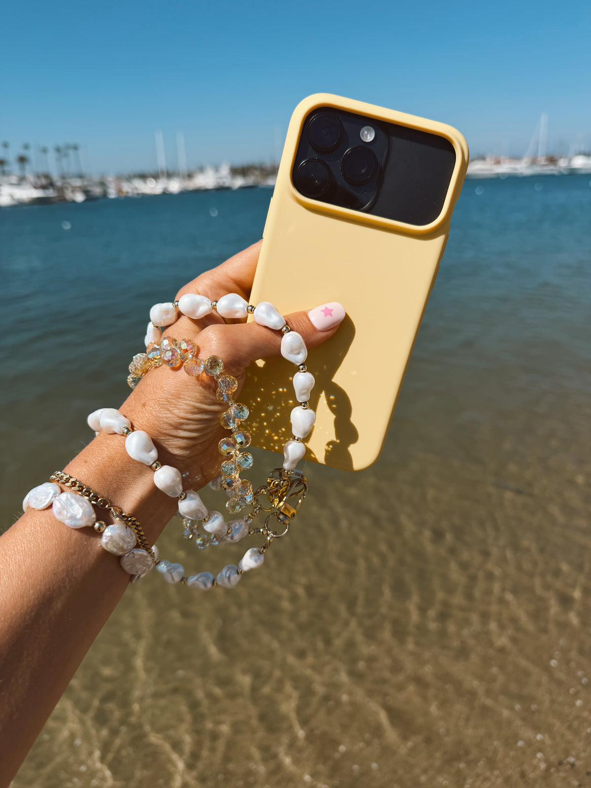 Lido Pearl Phone Wristlet – Pearl Wrist Strap | Palmie