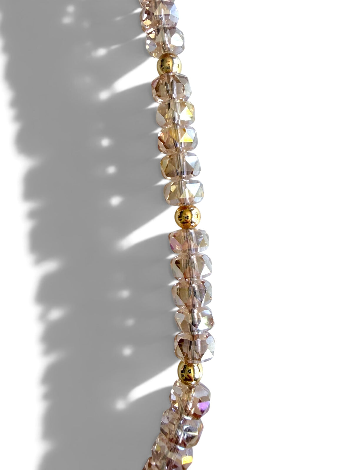 The Montage Champagne | Crystal Beaded Phone Wristlet