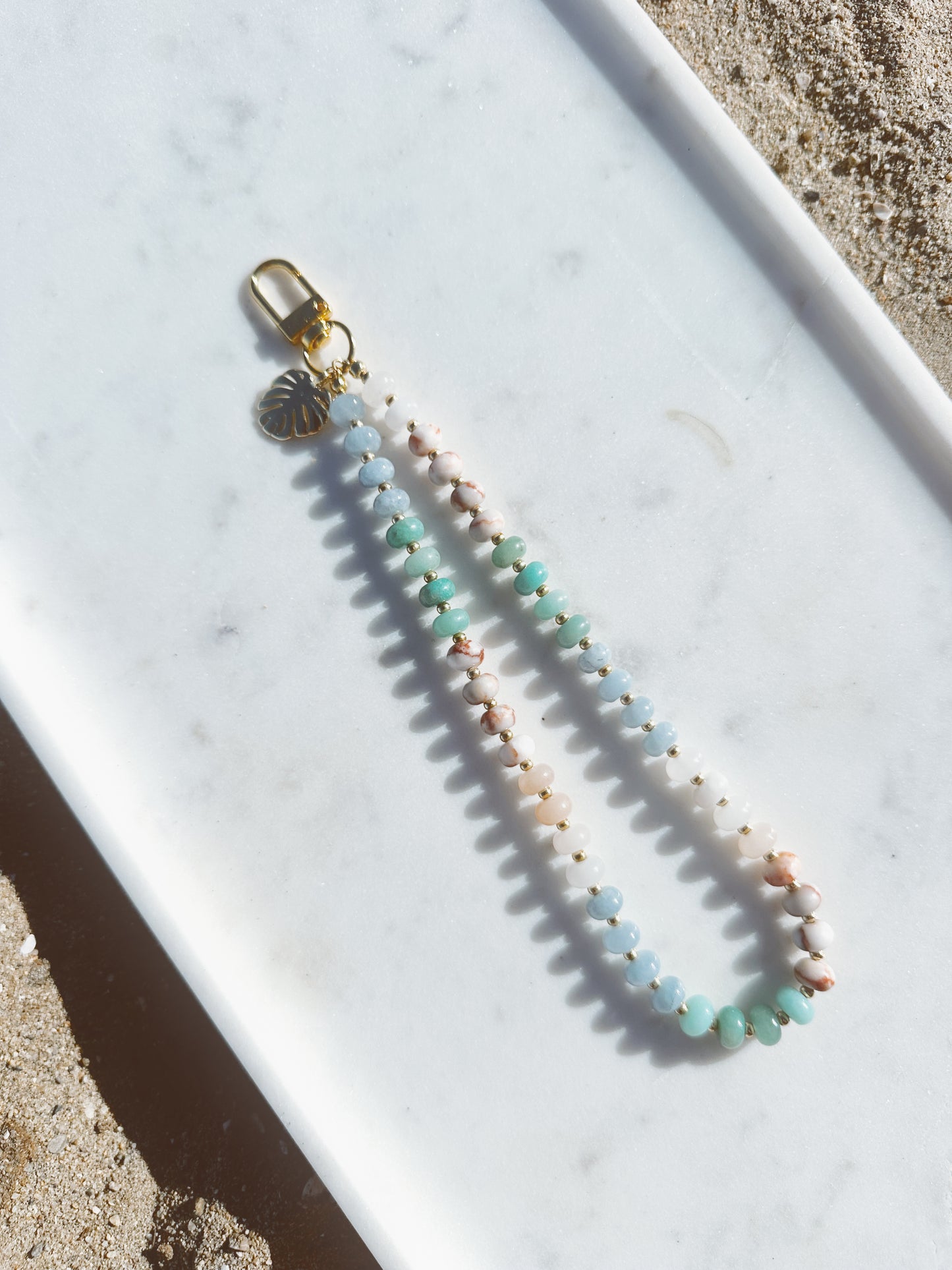 Crystal Cove Phone Wristlet – Coastal Stone Wrist Strap | Palmie