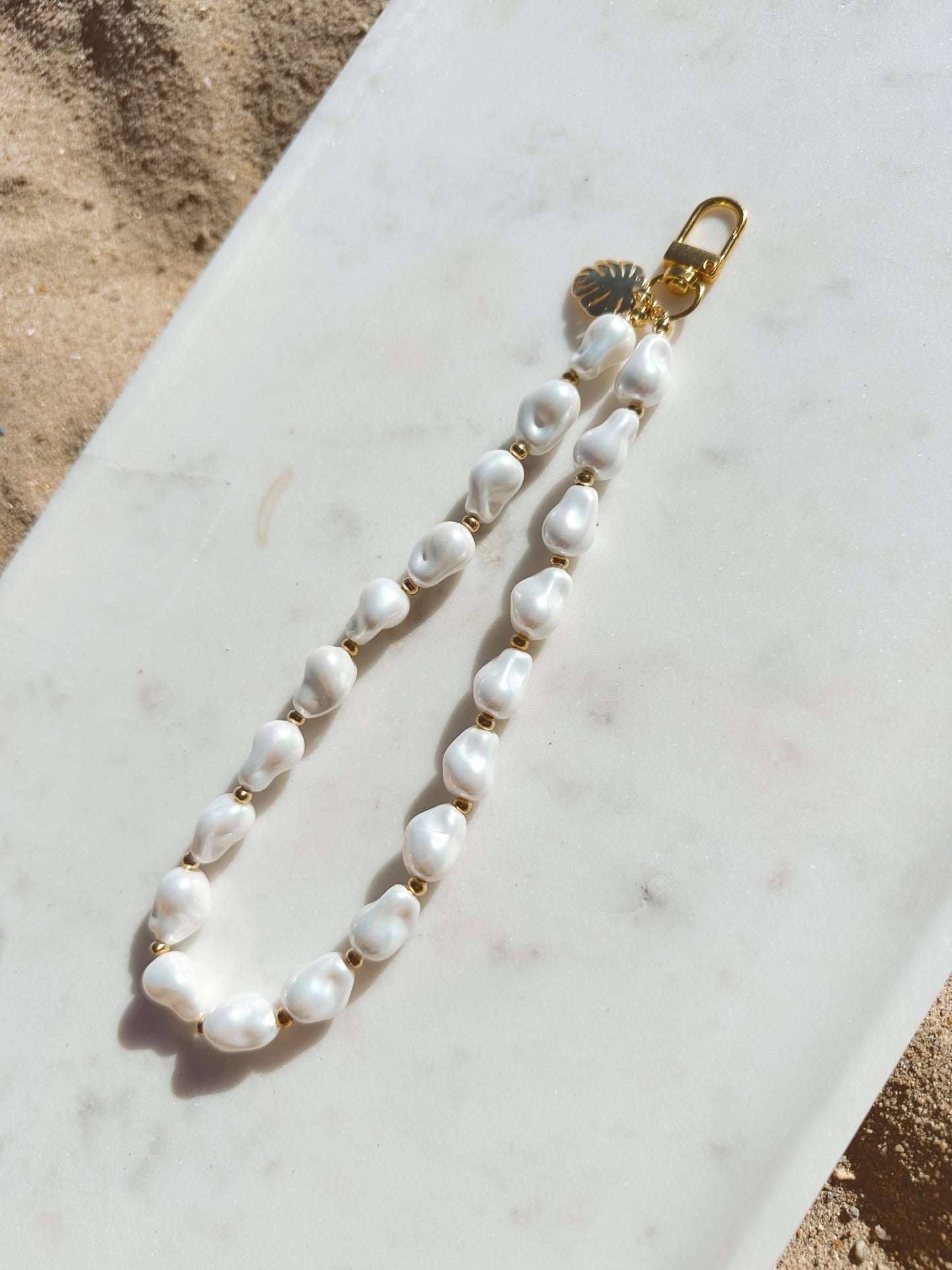 Lido Pearl Phone Wristlet – Pearl Wrist Strap | Palmie